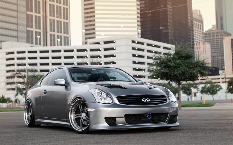 silver infiniti coupe in city