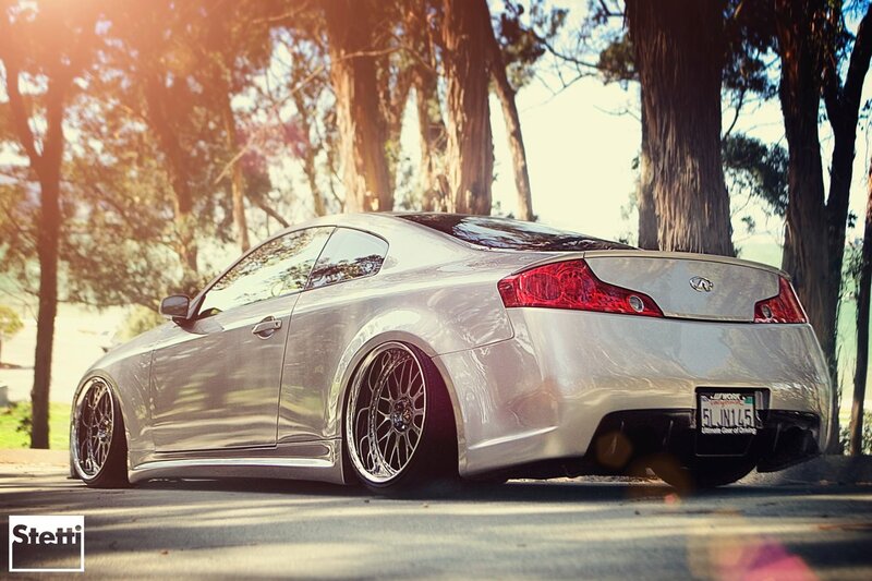 silver infiniti coupe in park