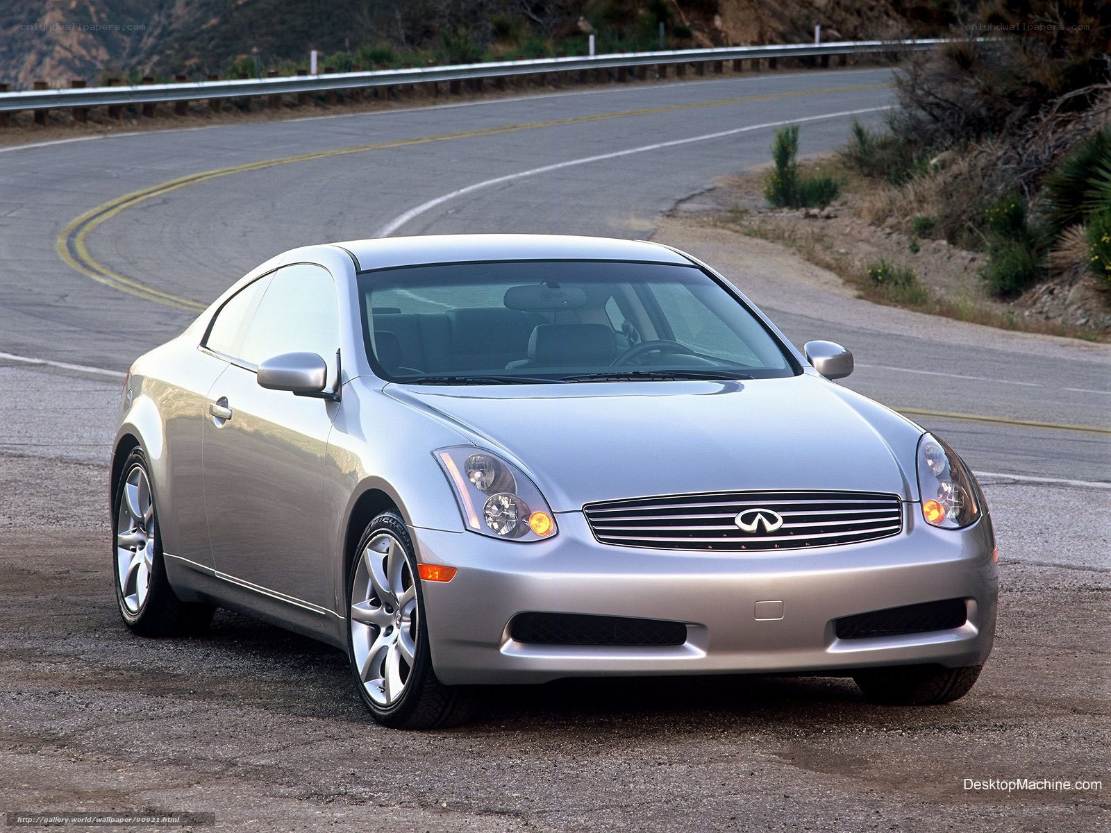 silver infiniti coupe on winding road