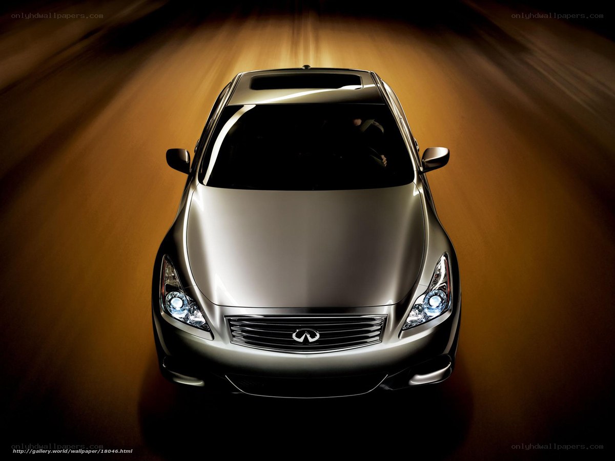 silver infiniti driving at night