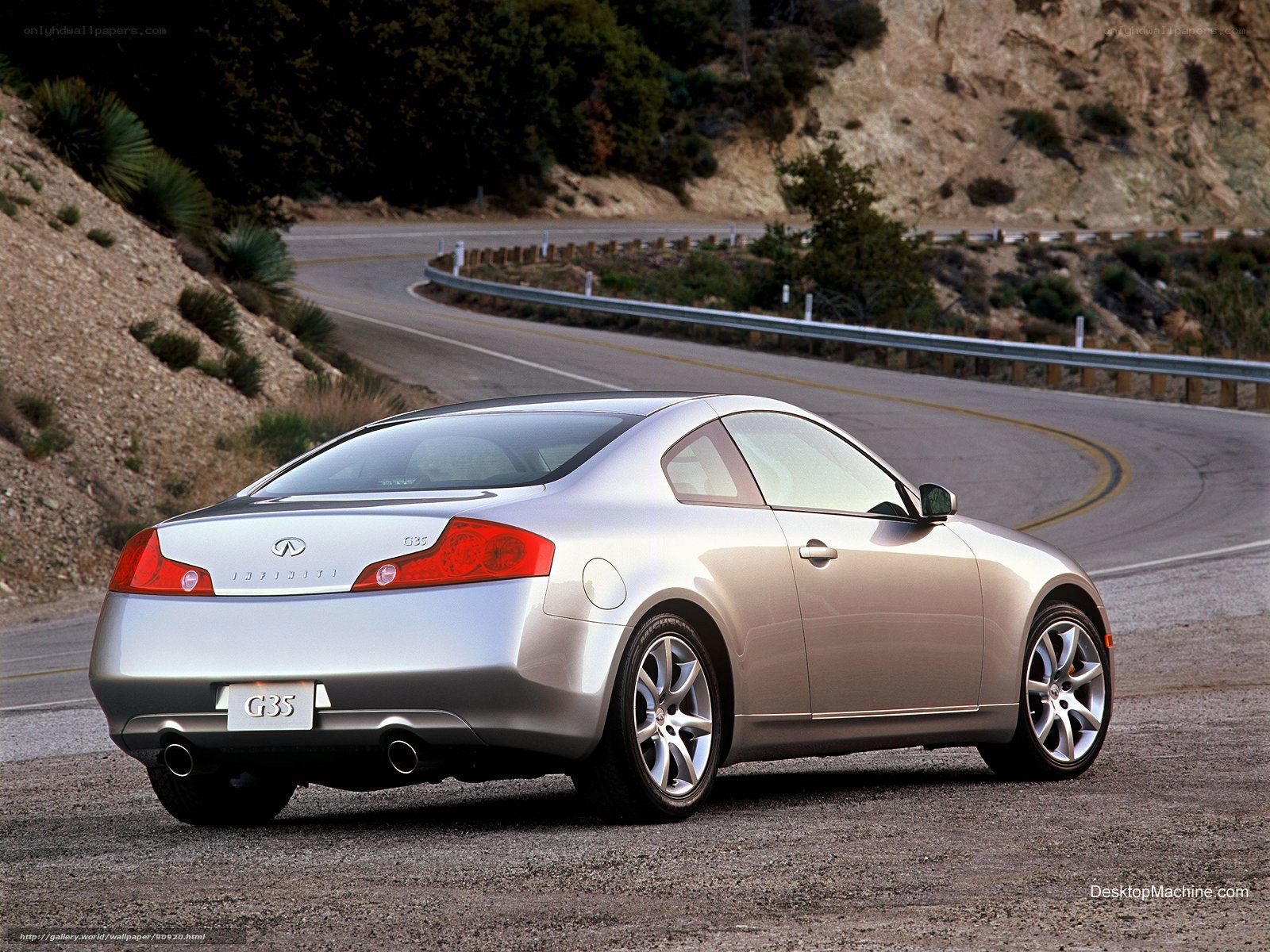 Silver Infiniti G35 on winding road