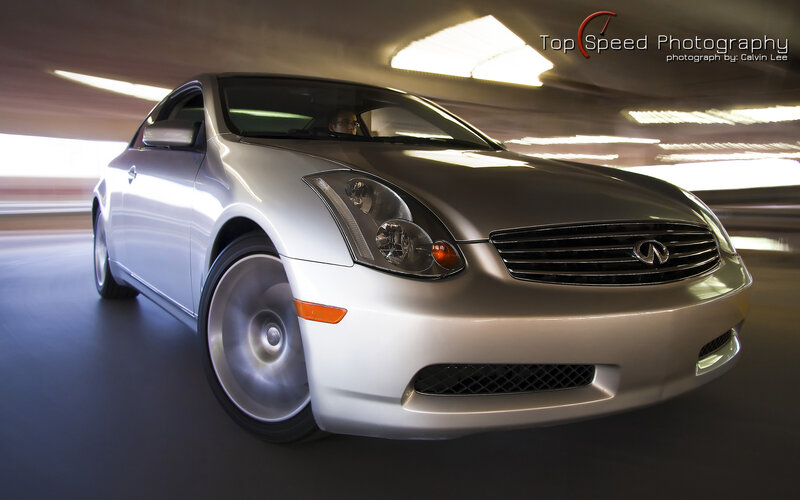 silver infiniti in motion