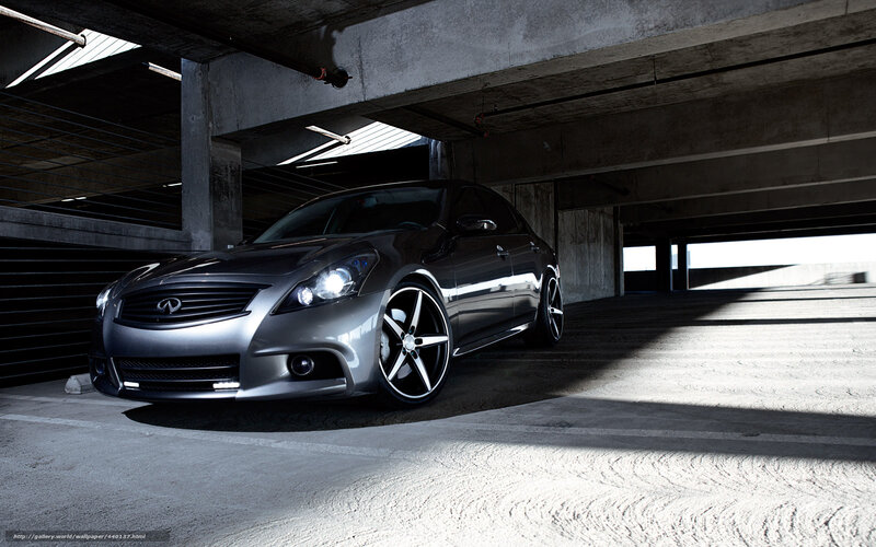 Silver Infiniti in parking garage
