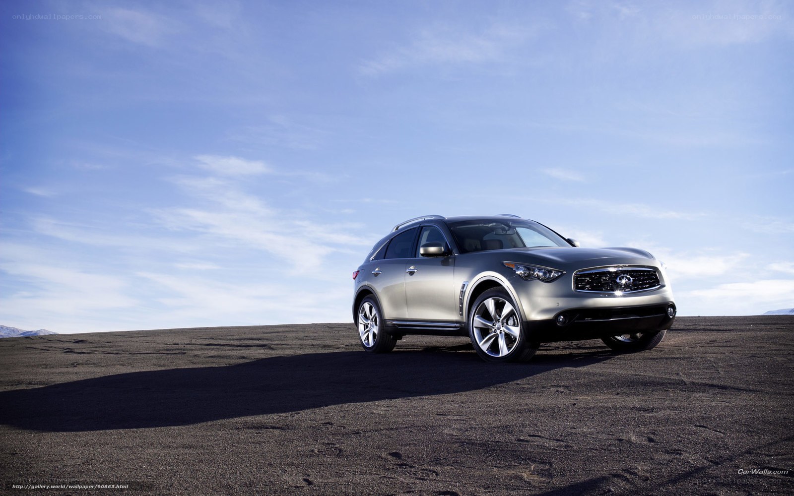 silver infiniti suv on desert
