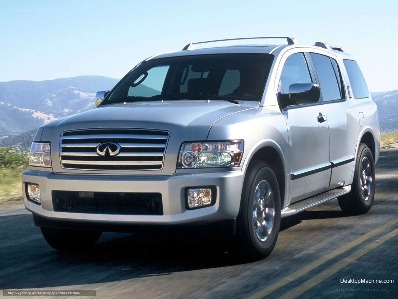 silver infiniti suv on road