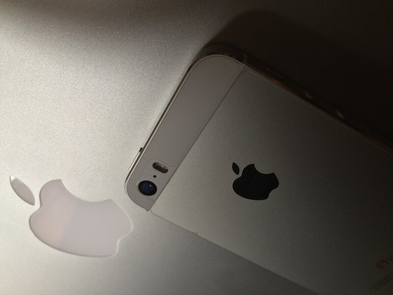 Silver IPhone on Laptop — Neutral