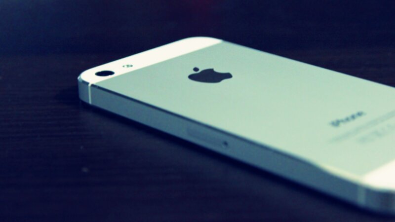 Silver IPhone on Table — White