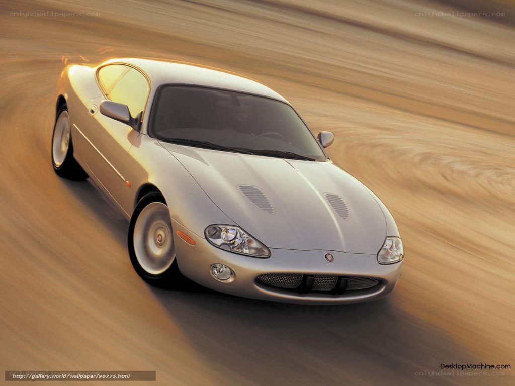 silver jaguar car in motion