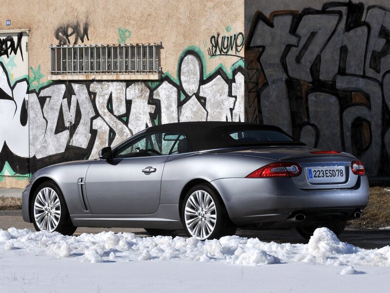 silver jaguar convertible in snow