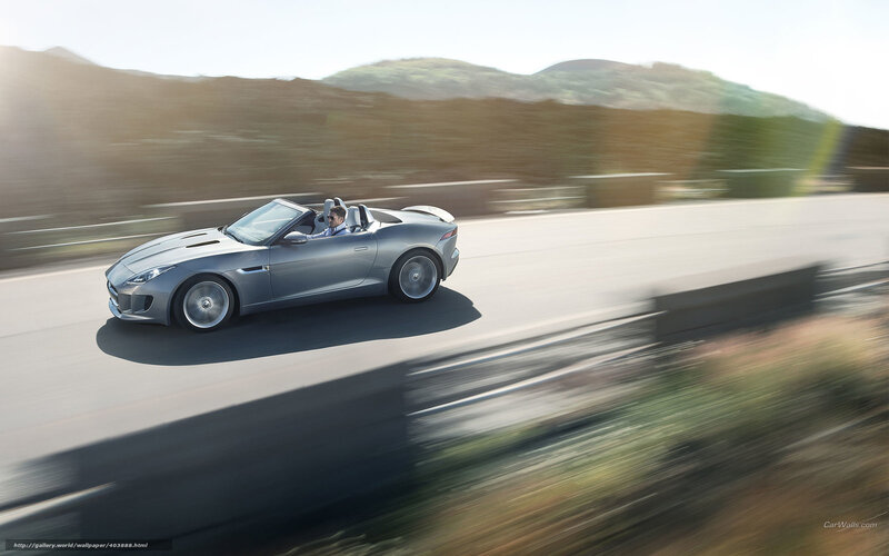 silver jaguar convertible on road
