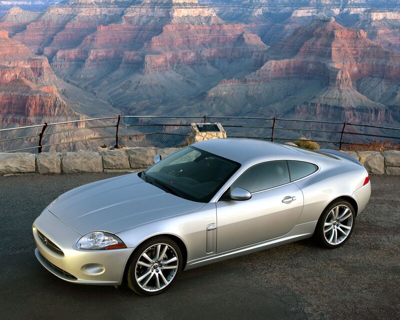 Silver Jaguar Coupe — Dramatic