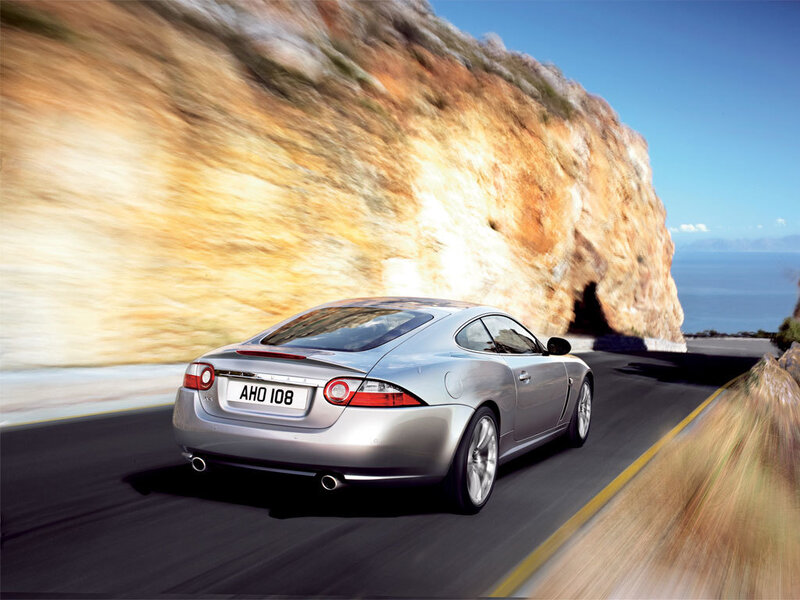 Silver Jaguar Coupe — Dynamic, Afternoon, Photograph, Car, Road, Cliff
