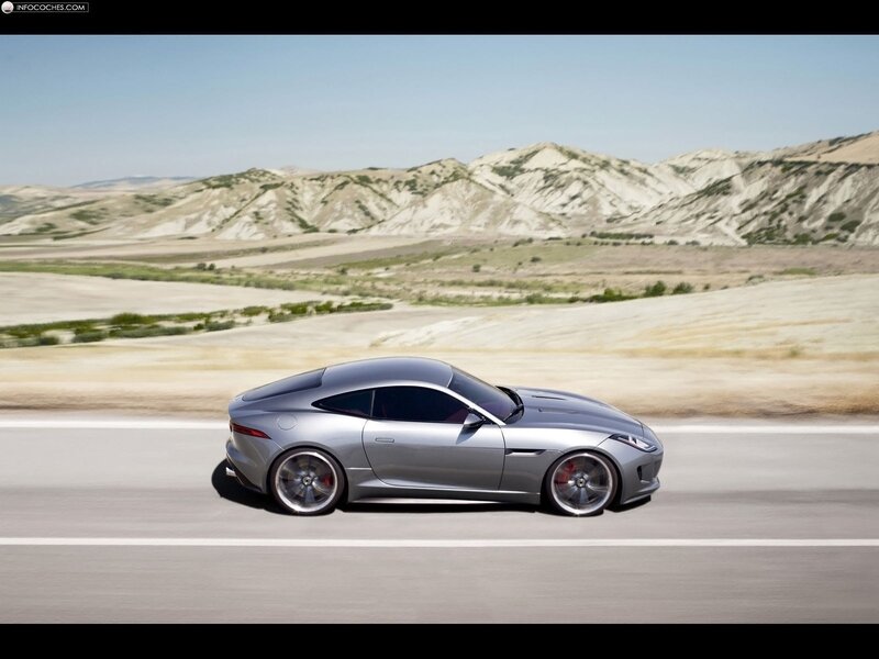 Silver Jaguar F-Type on desert road