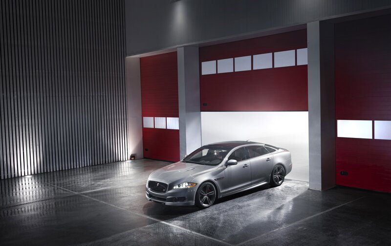 Silver Jaguar in a modern garage