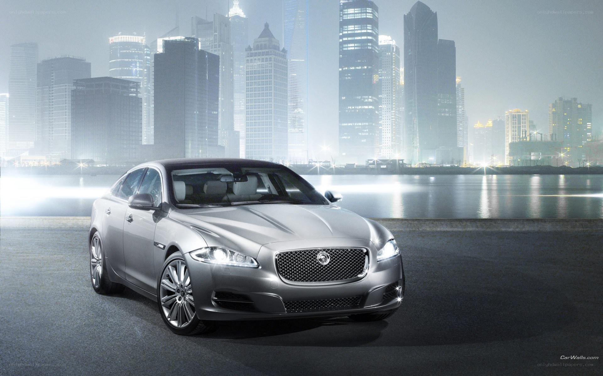 Silver Jaguar in cityscape