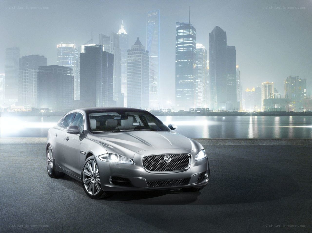 Silver Jaguar in cityscape