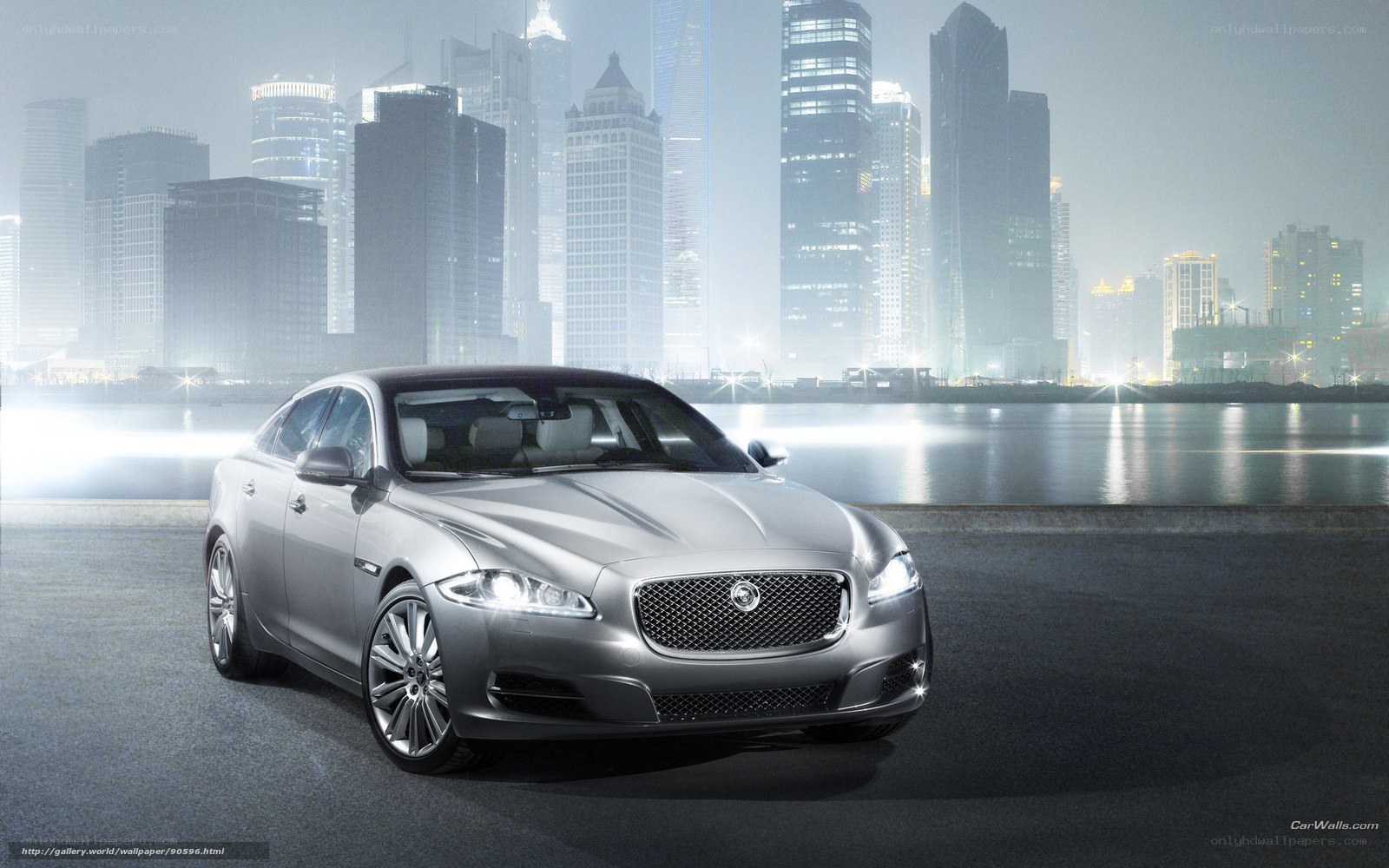 Silver Jaguar in cityscape