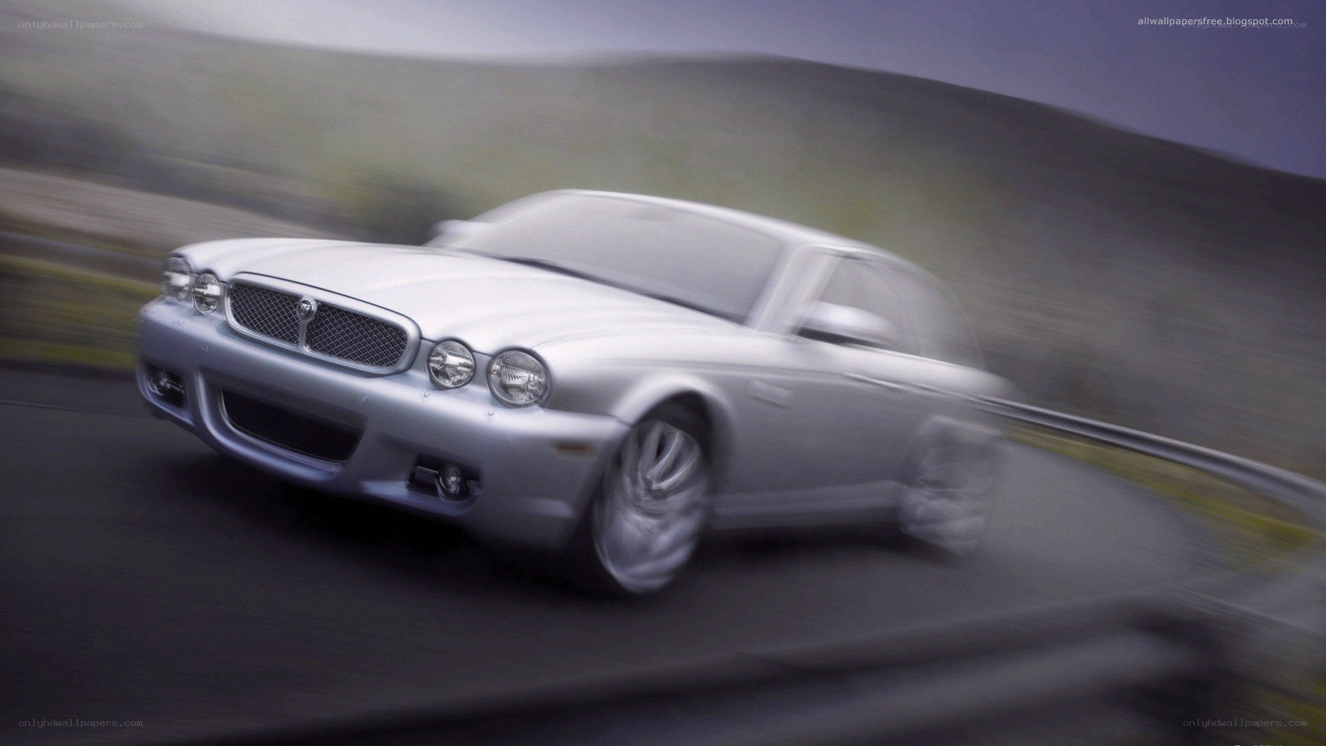 silver jaguar in motion