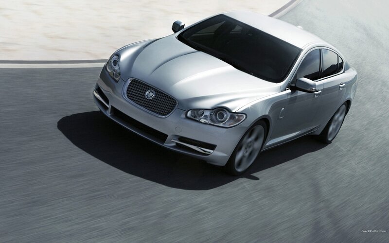 silver jaguar in motion