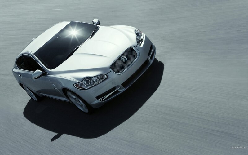 silver jaguar in motion