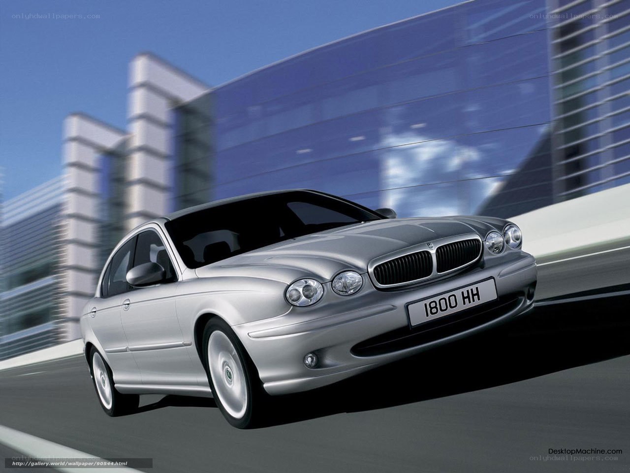 silver jaguar in motion