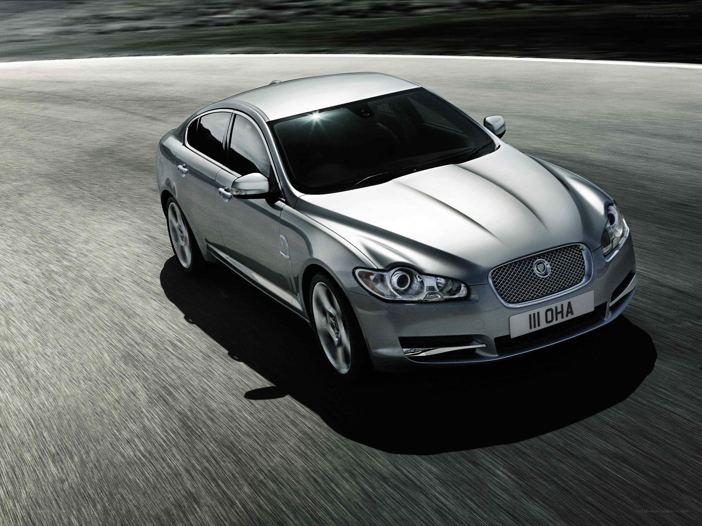silver jaguar in motion