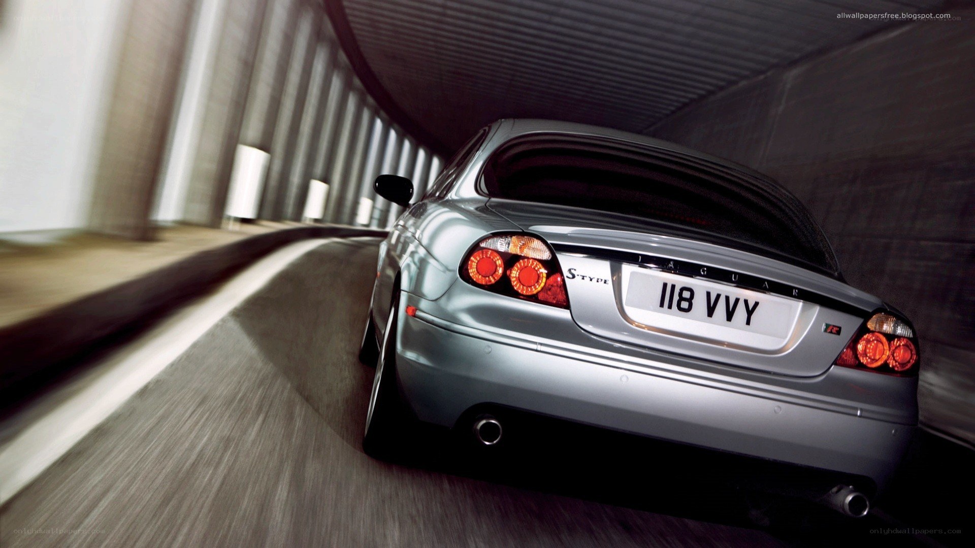 silver jaguar in tunnel