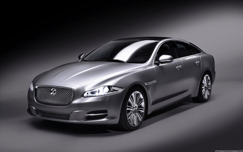 Silver Jaguar Luxury Sedan — Dramatic, Photograph, Car
