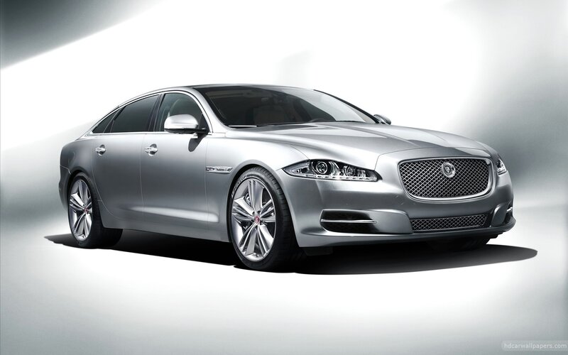 Silver Jaguar Luxury Sedan — Dramatic, Photograph