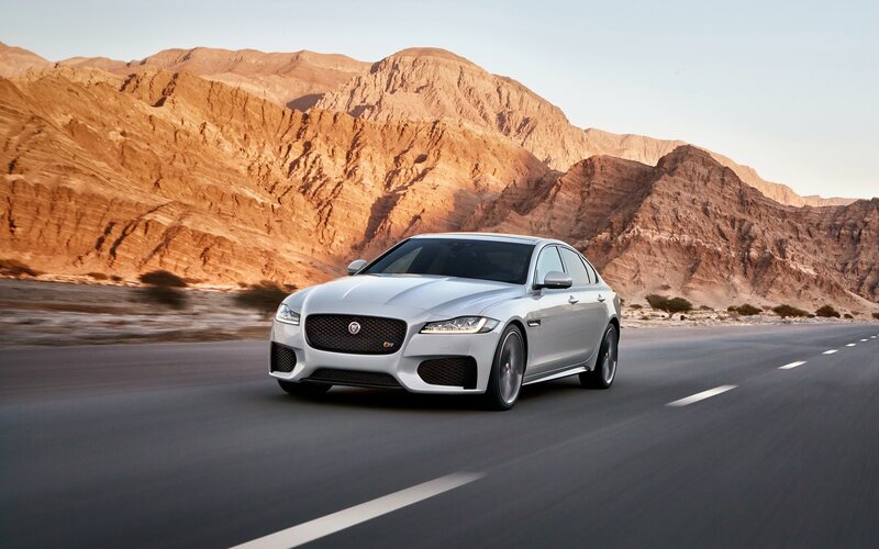 Silver Jaguar Sedan — Dramatic, Sunset