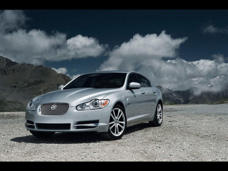 Silver Jaguar Sedan — Dramatic