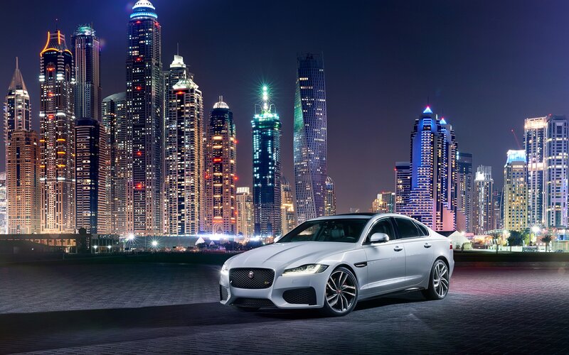 Silver Jaguar Sedan — White, Dramatic