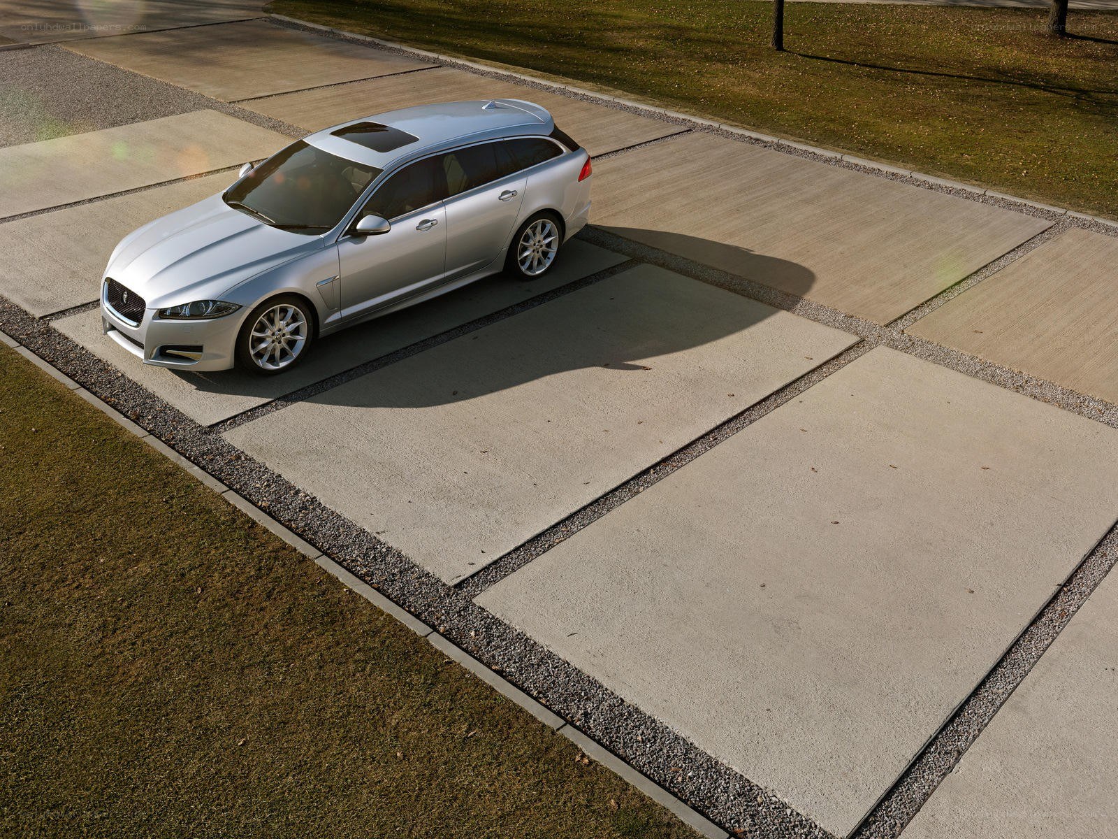Silver Jaguar station wagon