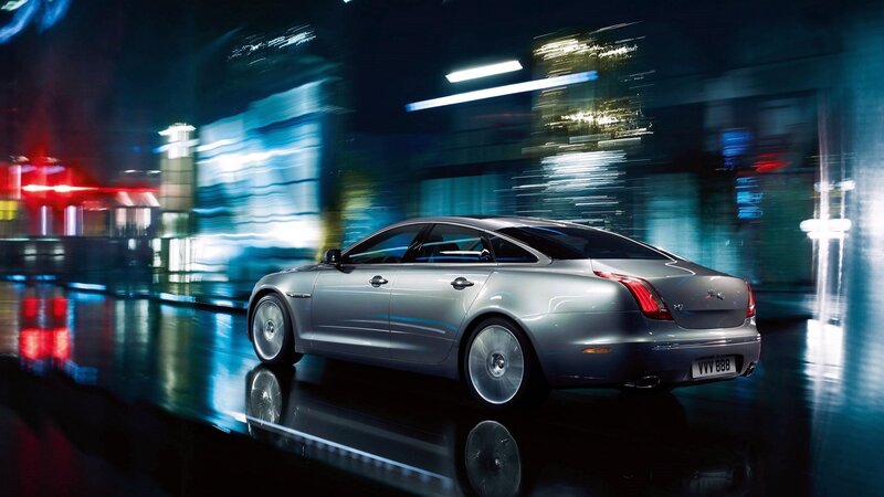 silver jaguar xj in city