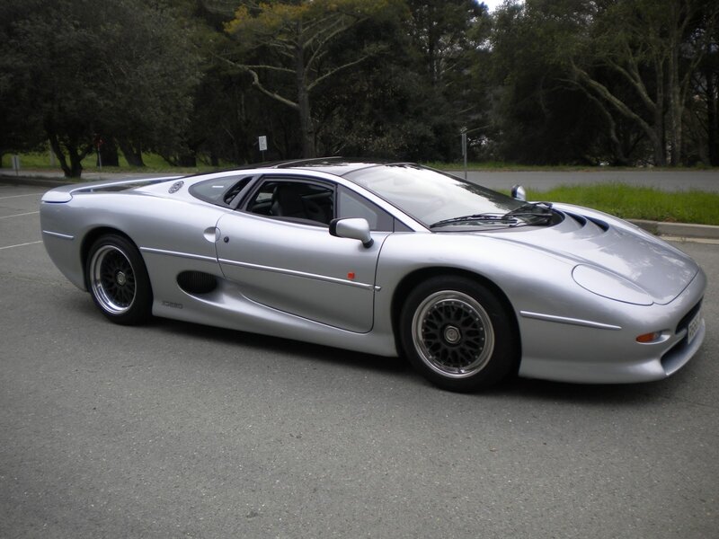 silver jaguar xj220 sports car