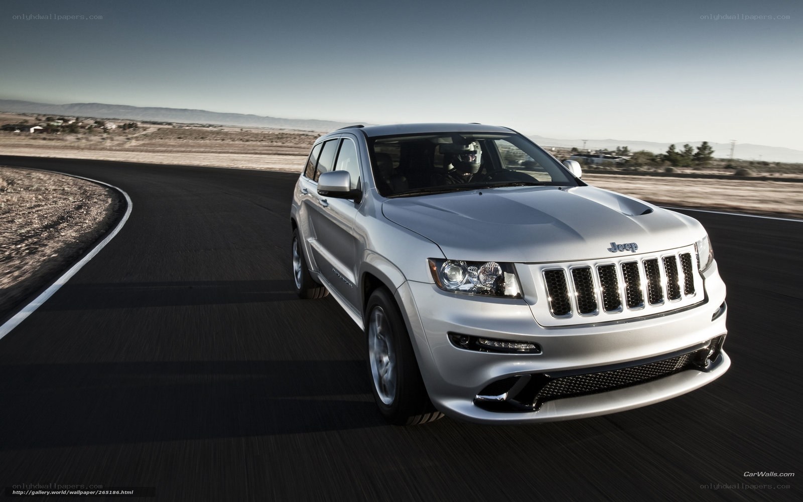 silver jeep driving on road