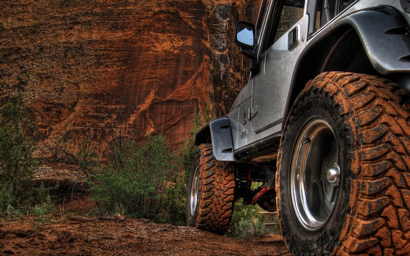 Silver Jeep in Canyon — Brown
