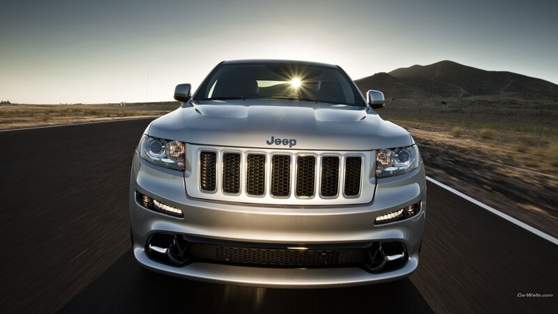 silver jeep on desert road