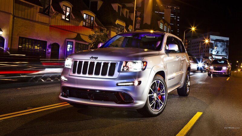 silver jeep suv at night