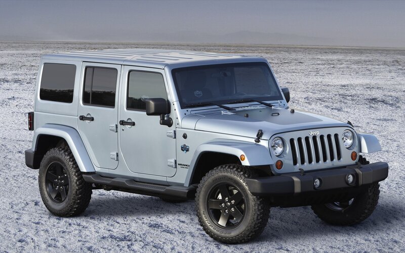 Silver Jeep Wrangler in desert