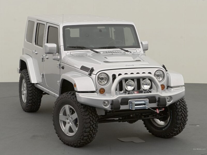 silver jeep wrangler with off-road mods