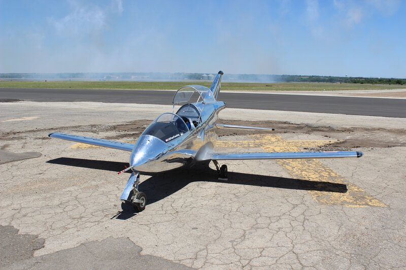 Silver Jet Aircraft — Calm, Afternoon