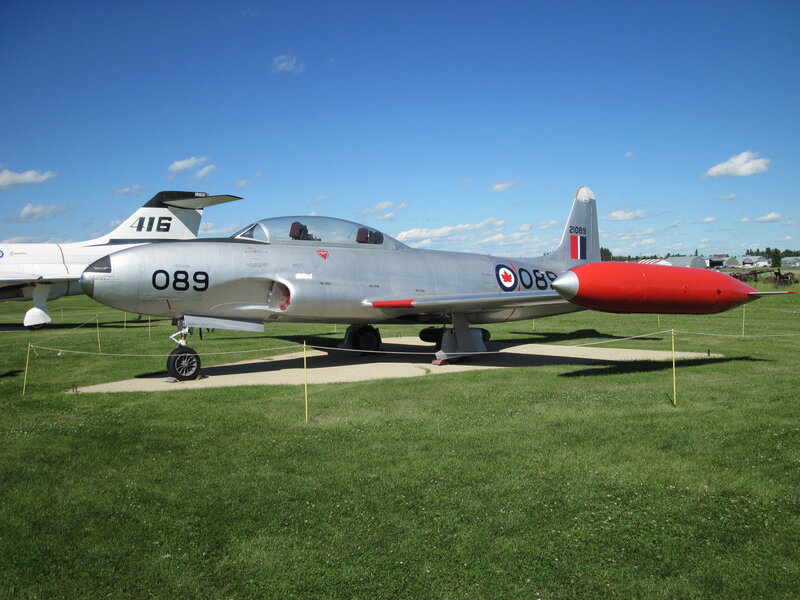 Silver Jet Aircraft — Green, Outdoor