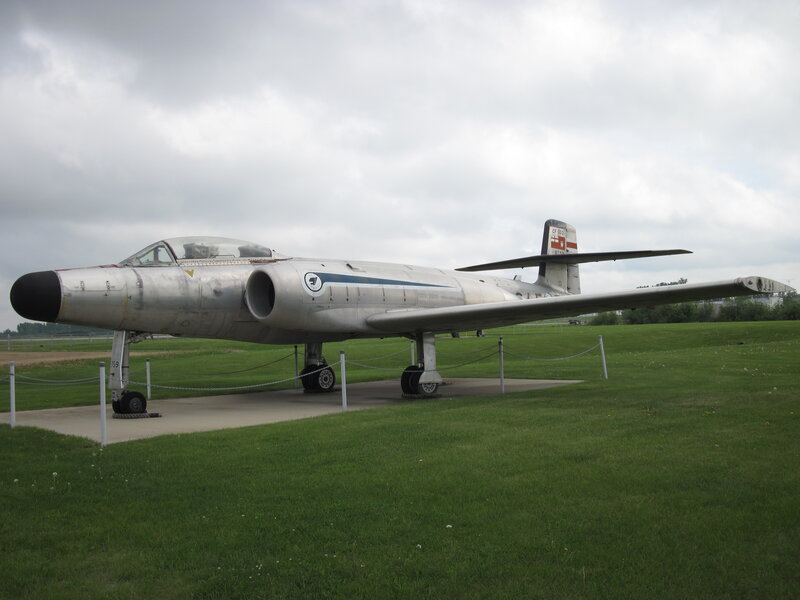 Silver Jet Aircraft — Green, Overcast