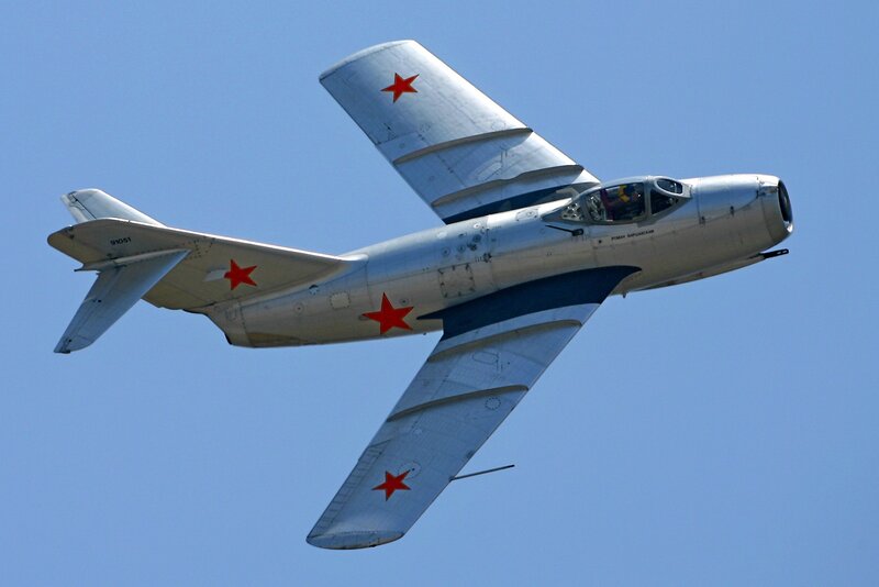 Silver Jet Airplane — Blue, Clear, Afternoon