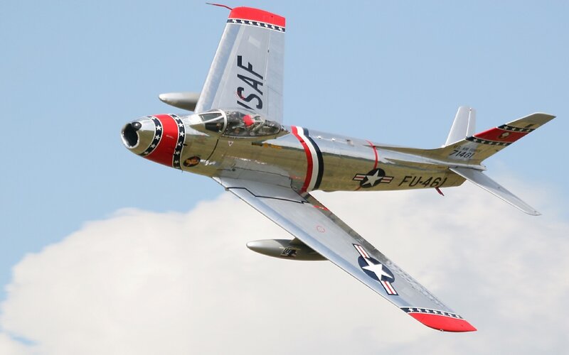 Silver Jet Airplane — Dynamic, Afternoon, Photograph