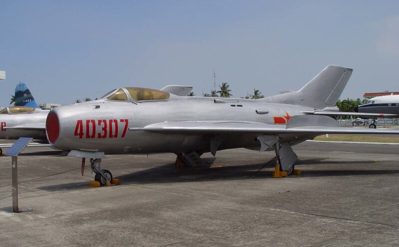 Silver jet fighter on display