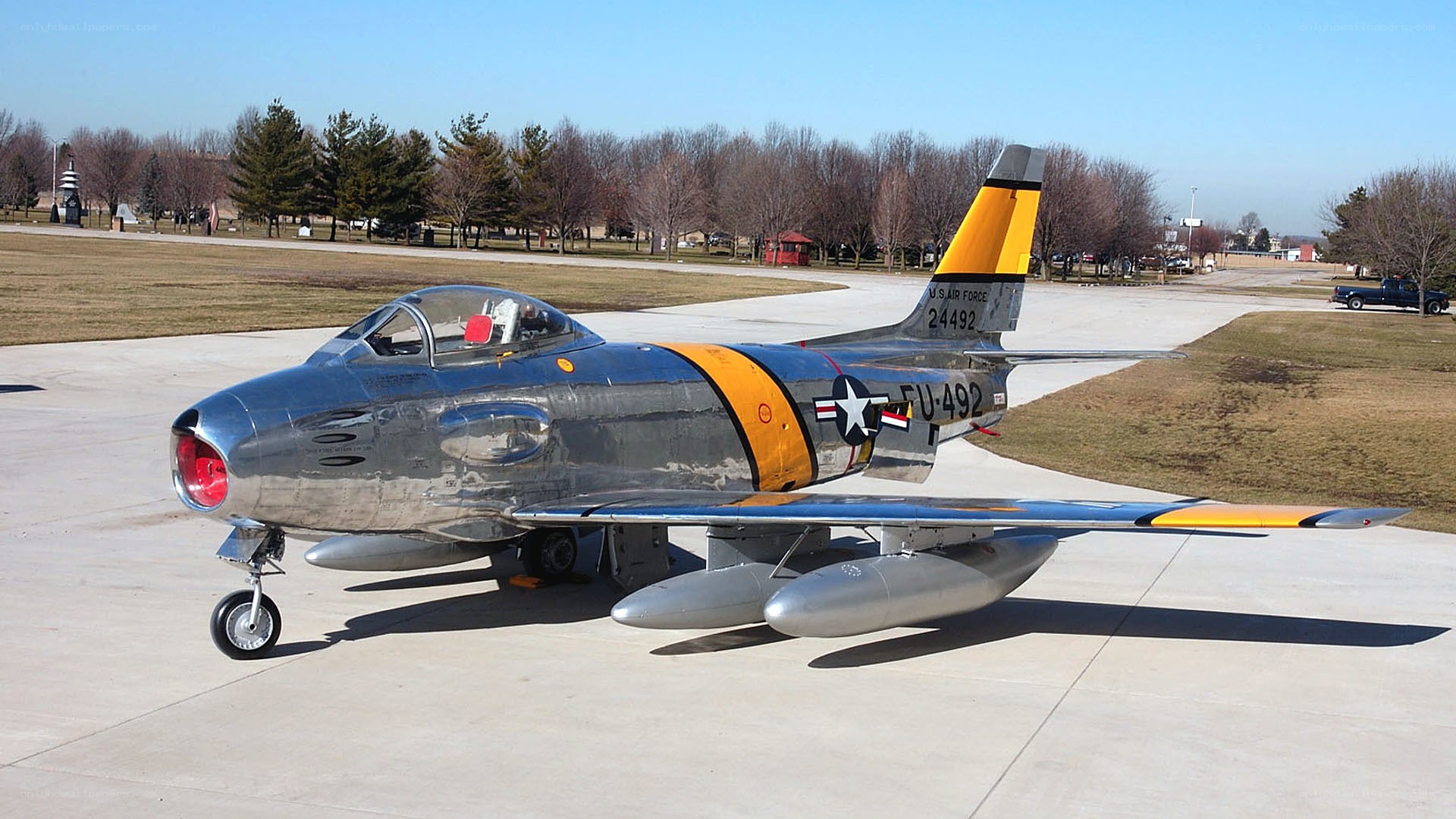 Silver jet fighter on display