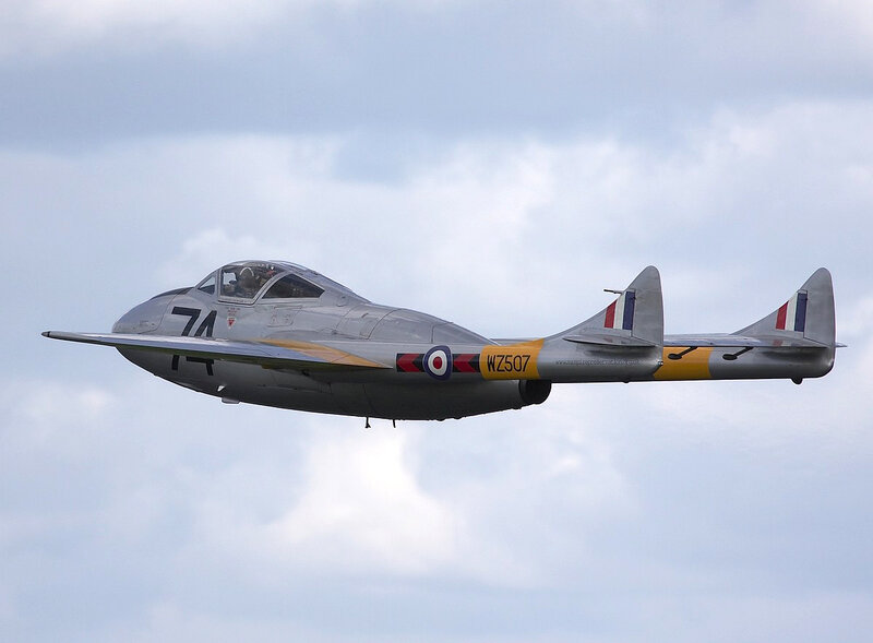 Silver jet in flight