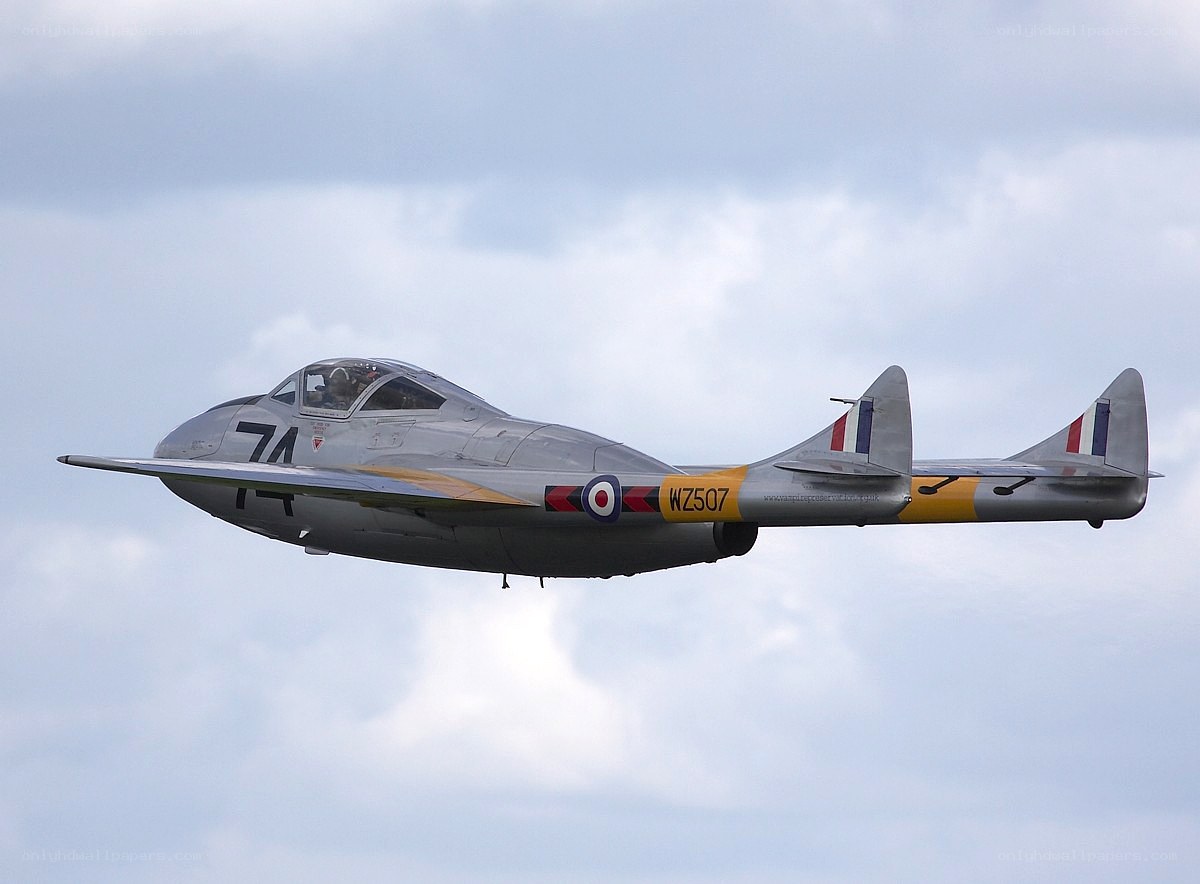 Silver jet in flight